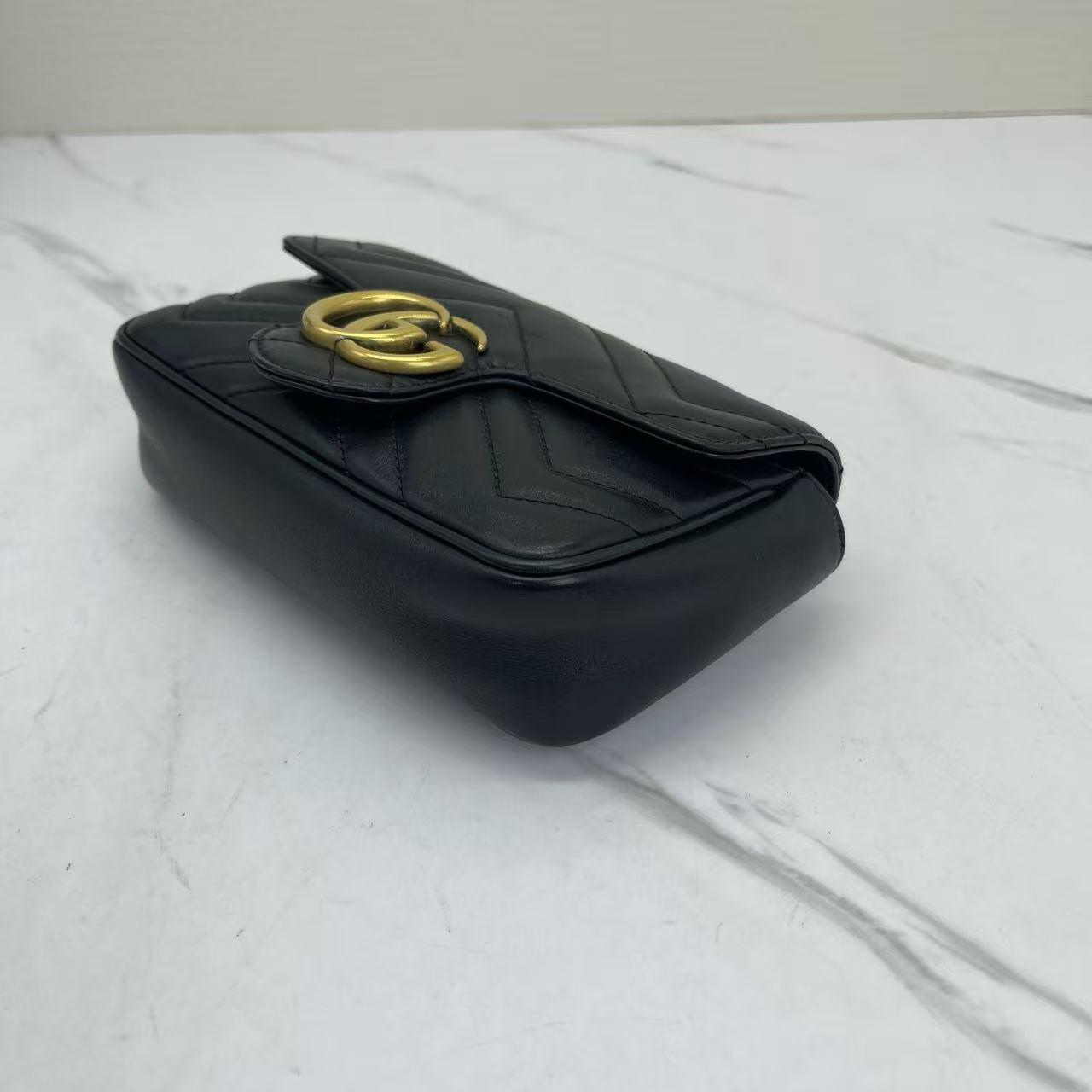 Gucci - GG Marmont Super Mini Shoulder Bag - Matelassé leather - Black with Gold-Tone Hardware - (mini)