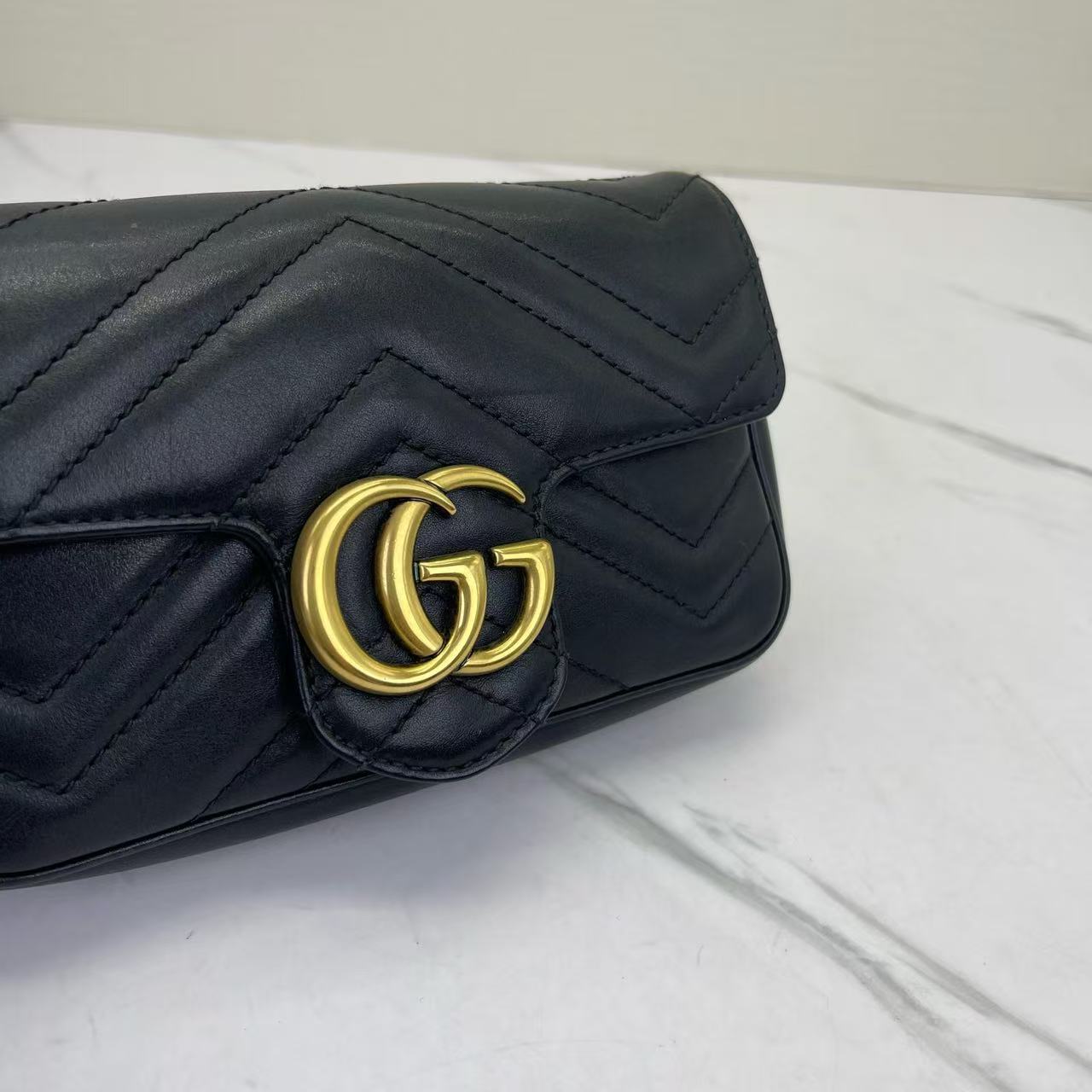 Gucci - GG Marmont Super Mini Shoulder Bag - Matelassé leather - Black with Gold-Tone Hardware - (mini)