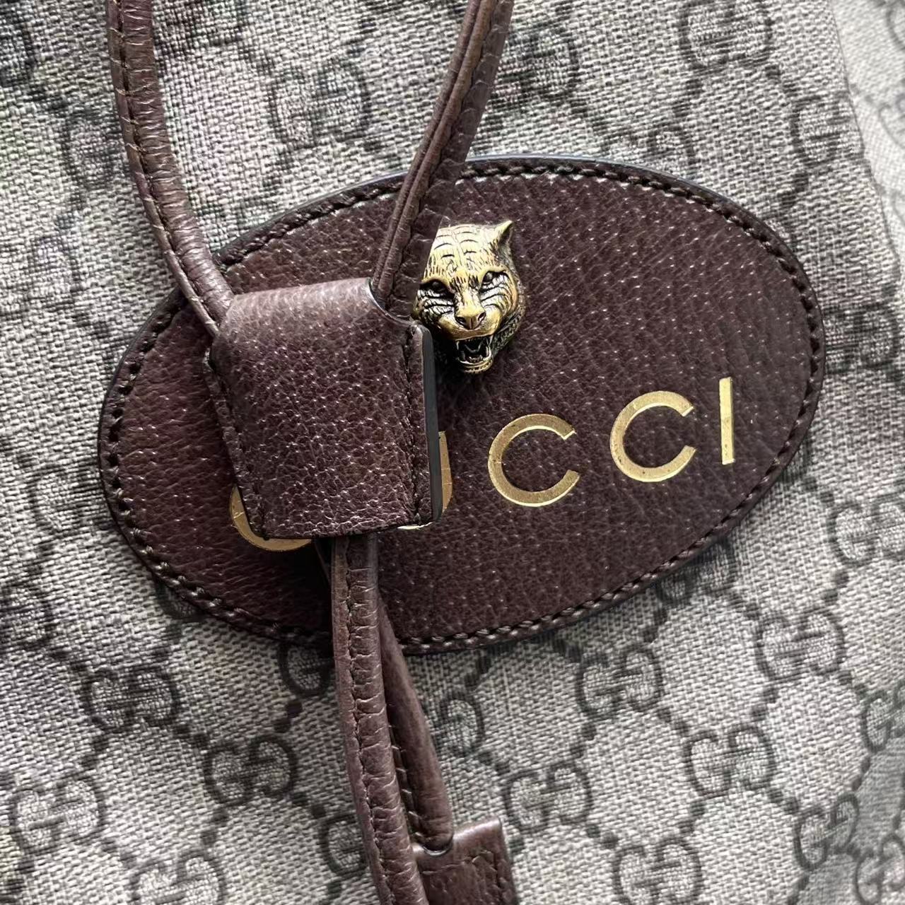 Gucci - GG Supreme Tiger Head Drawstring Bucket Bag - Coated canvas with leather trim - Beige and Brown with Gold-Tone Hardware - (medium)