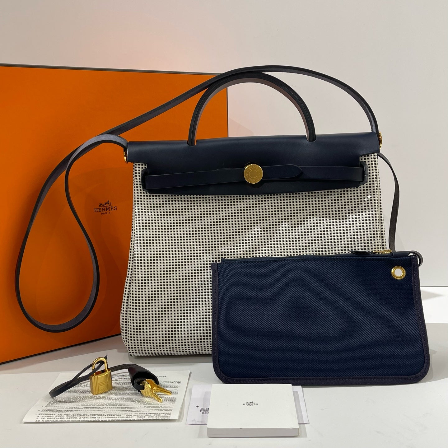 Hermès - Herbag Zip Retourne 31 - Canvas and leather - Black, White, and Midnight Blue with Gold-Tone Hardware - (Medium)
