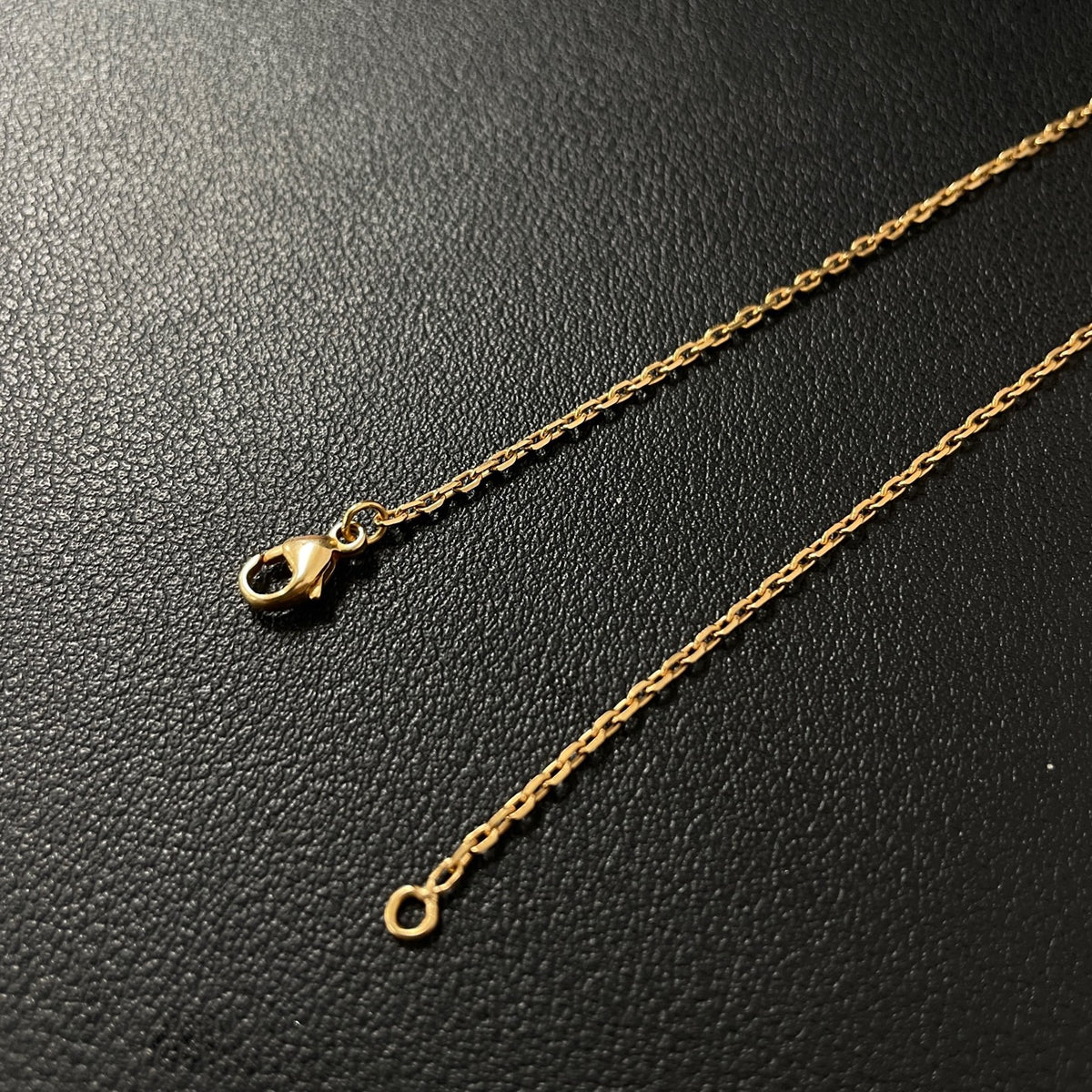 Hermes - Mini Pop H - Lacquered metal pendant with a rose-gold-tone metal chain; exact metal composition is not specified. - Orange