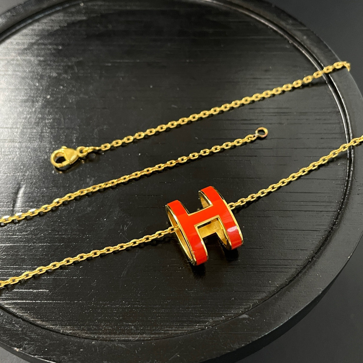 Hermes - Pop H Large - Metal with an orange lacquer pendant and gold-tone finish; exact metal composition is unspecified. - Orange - (40 cm)