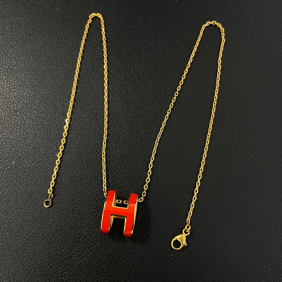 Hermes - Pop H Large - Metal with an orange lacquer pendant and gold-tone finish; exact metal composition is unspecified. - Orange - (40 cm)