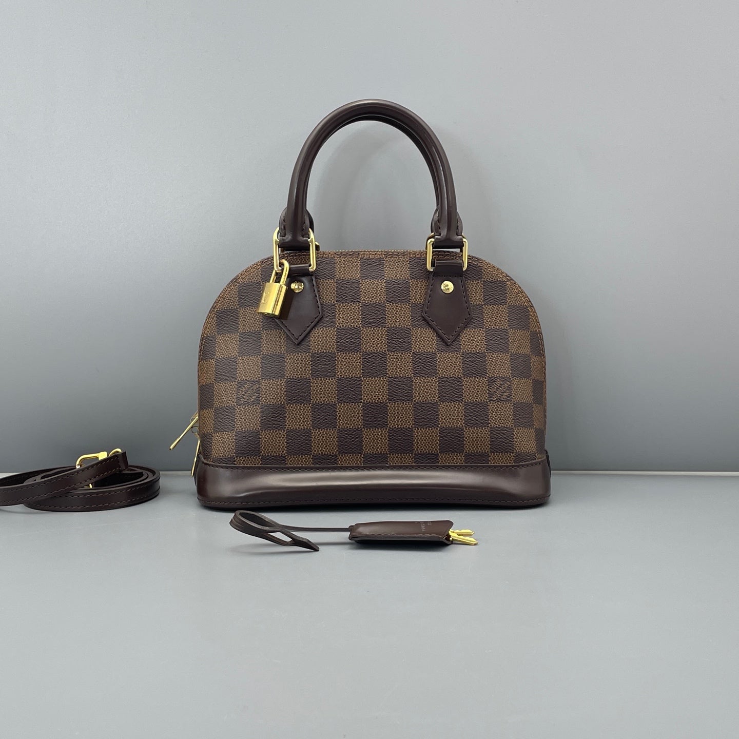 Louis Vuitton - Alma BB - Damier Ebène coated canvas with smooth leather trim - Brown - (mini)