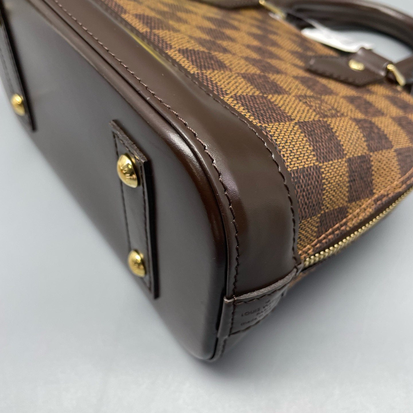 Louis Vuitton - Alma BB - Damier Ebene coated canvas with smooth leather trim - Brown - (mini)