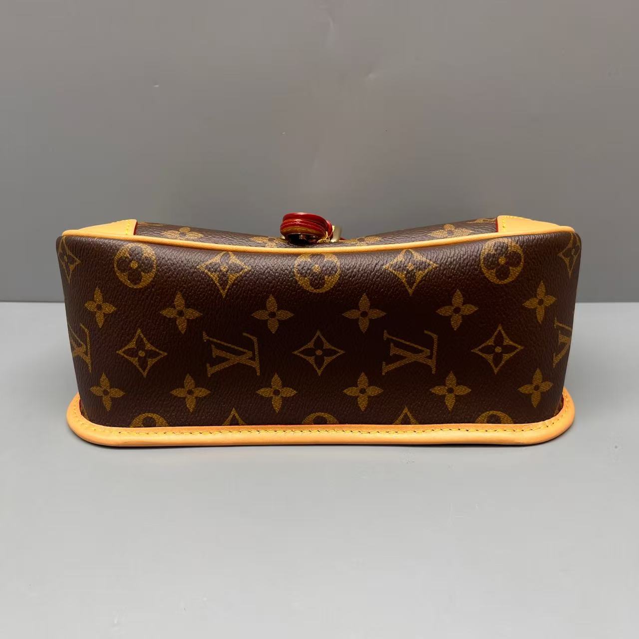Louis Vuitton - Baguette Bag - Monogram coated canvas with natural Vachetta leather trim - Brown - (small)