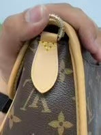 Louis Vuitton - Baguette - Monogram coated canvas with natural Vachetta leather trim and fabric strap - Brown - (small)