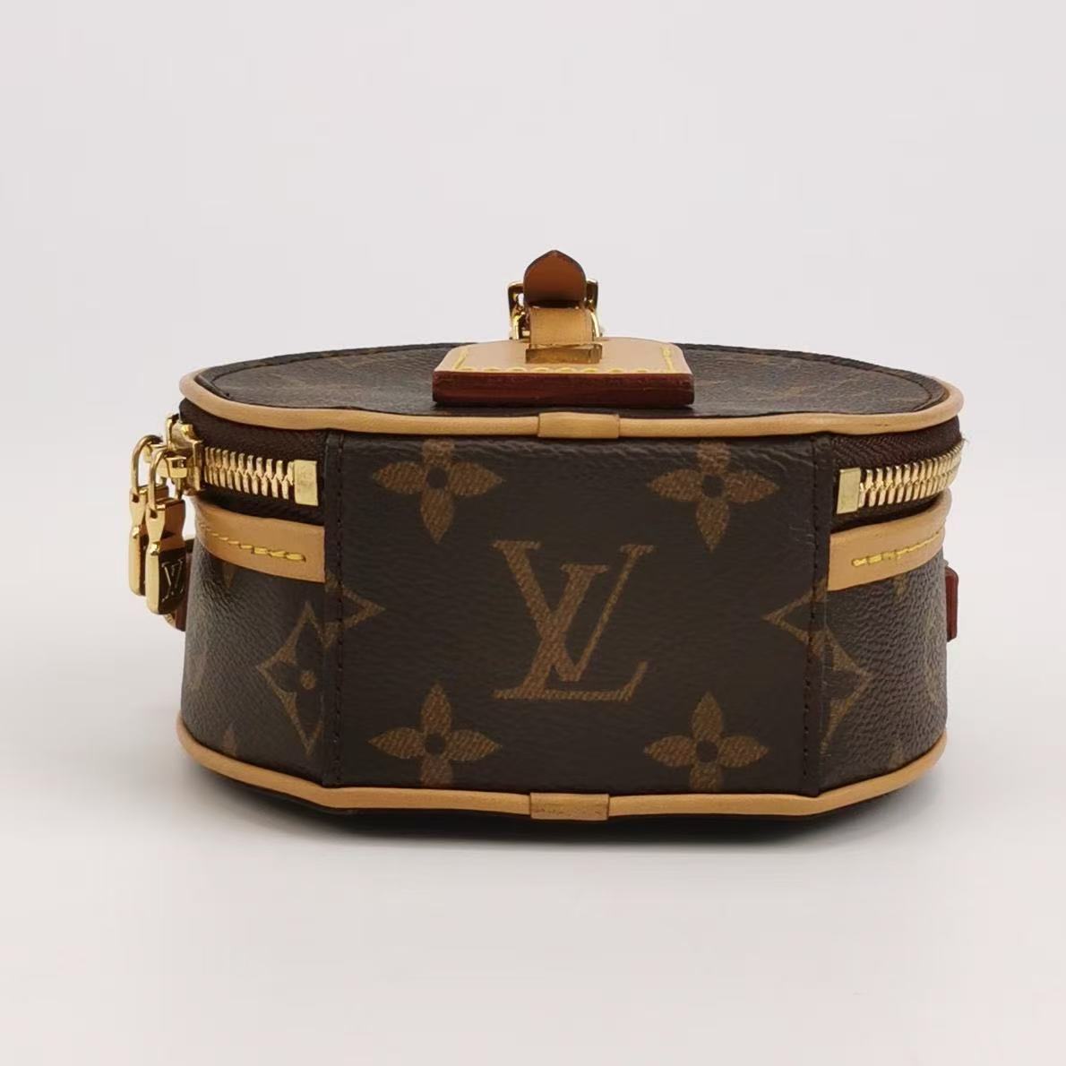 Louis Vuitton - Boite Chapeau - Monogram coated canvas with natural cowhide leather trim - Brown - (mini)