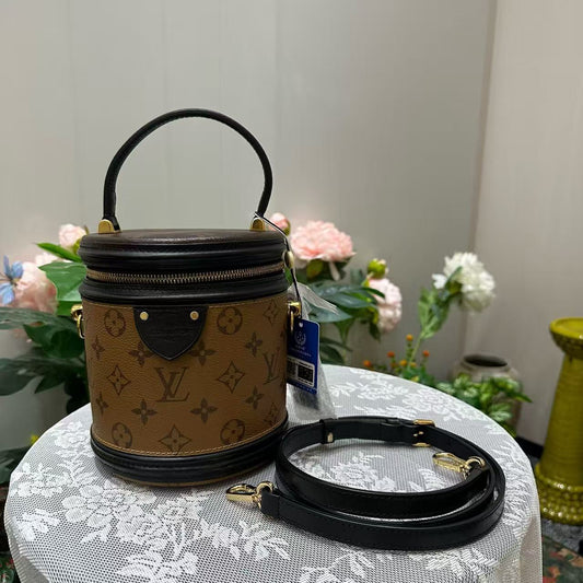 Louis Vuitton - Cannes - Monogram coated canvas with leather trim - Brown and Black with Gold-Tone Hardware - (mini)