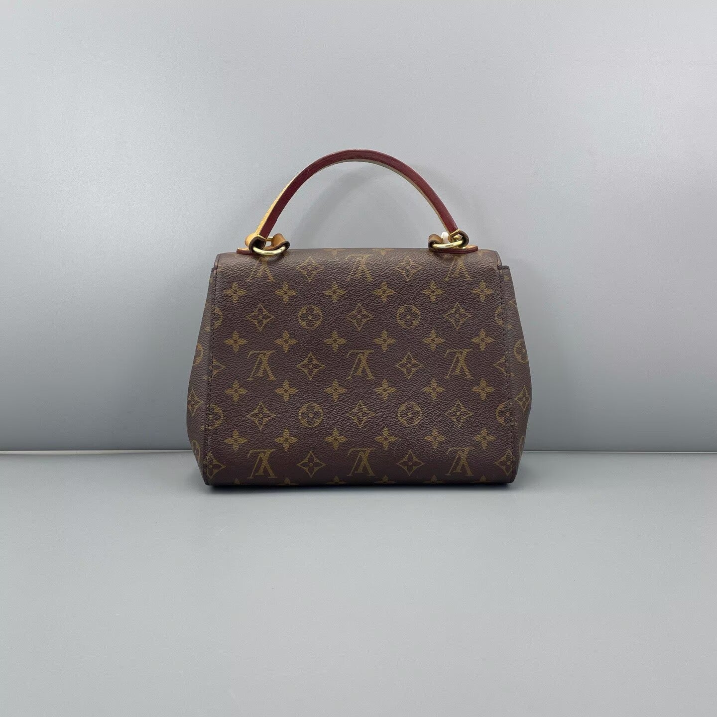 Louis Vuitton - Cluny BB - Monogram coated canvas with leather trim - Brown with pink interior and strap accents - (Small)