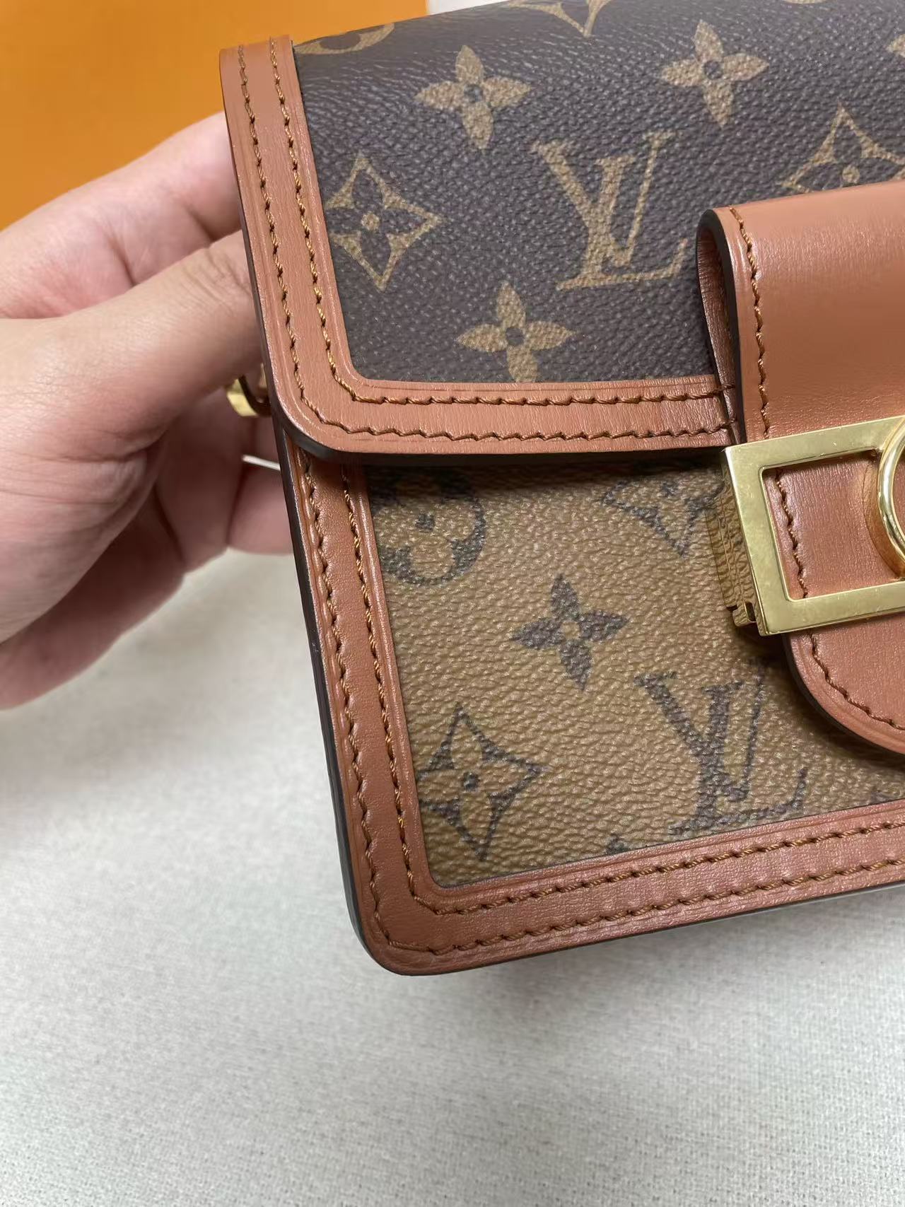 Louis Vuitton - Dauphine Mini - Monogram coated canvas with calfskin leather trim and microfiber lining - Brown with tan leather trim and gold-tone hardware - (mini)