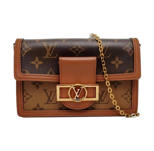 Louis Vuitton - Dauphine WOC - Monogram and Monogram Reverse coated canvas with leather trim - Brown - (mini)