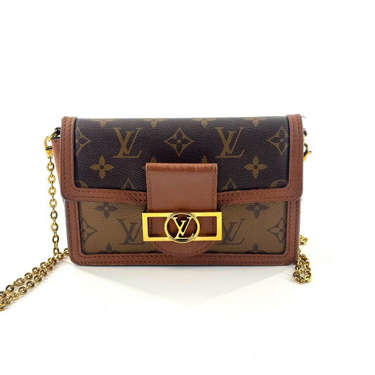 Louis Vuitton - Dauphine WOC - Monogram coated canvas with leather trim - Brown - (mini)