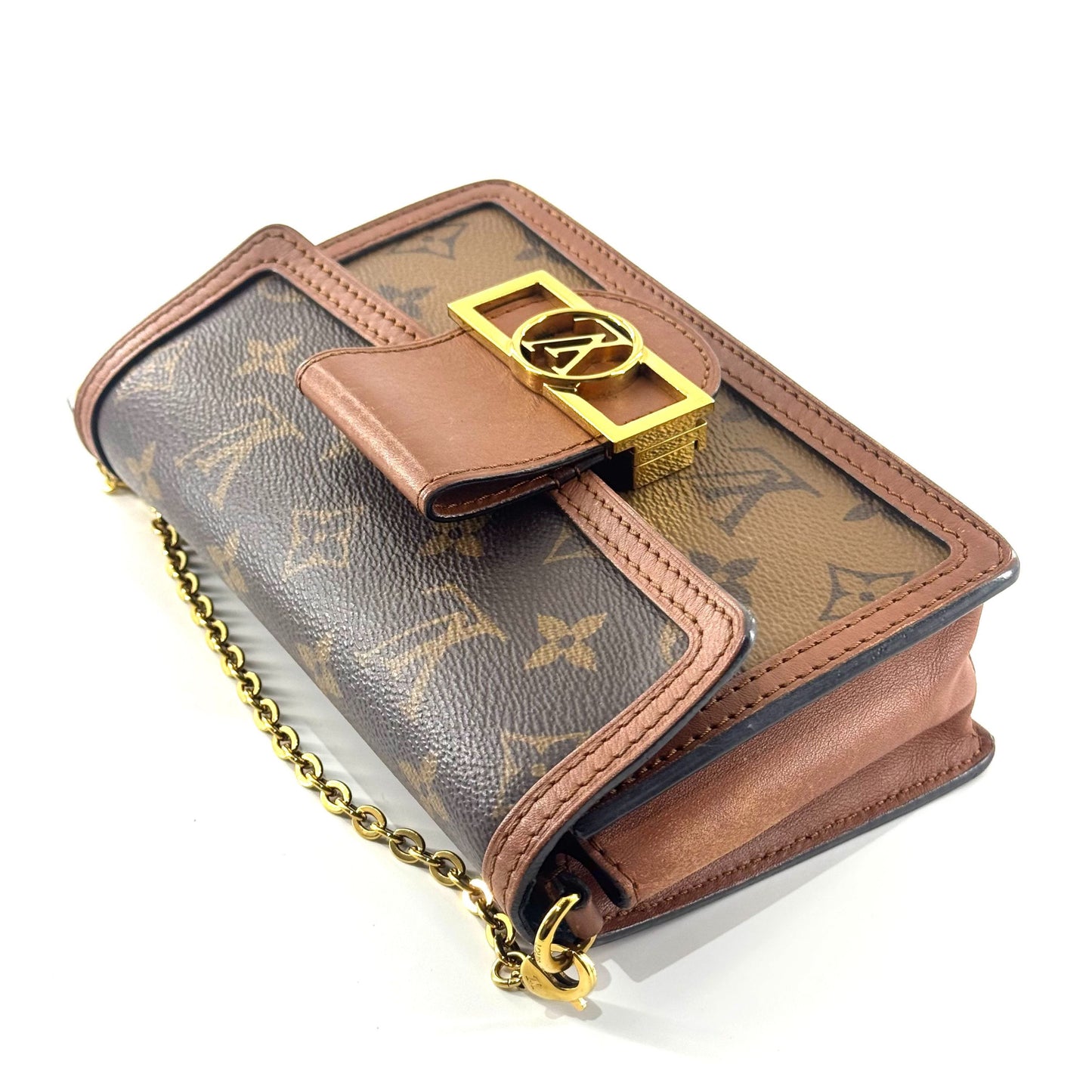 Louis Vuitton - Dauphine WOC - Monogram coated canvas with leather trim - Brown - (mini)
