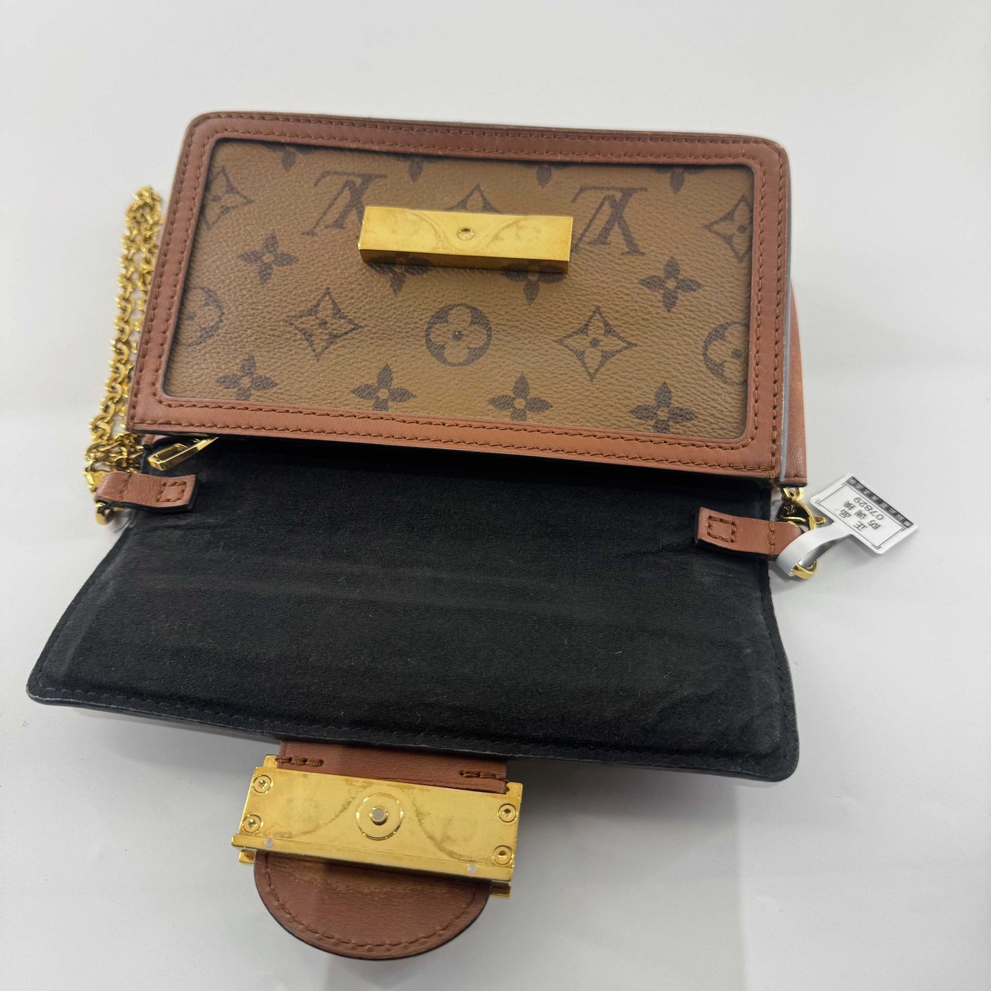 Louis Vuitton - Dauphine WOC - Monogram coated canvas with leather trim - Brown - (mini)
