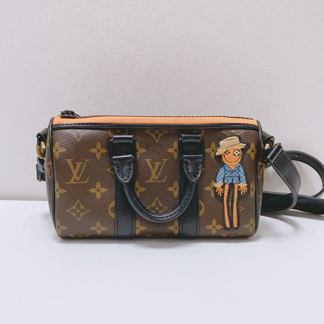 Louis Vuitton - Keepall XS Scarecrow - Monogram coated canvas with leather trim - Brown - (Mini)