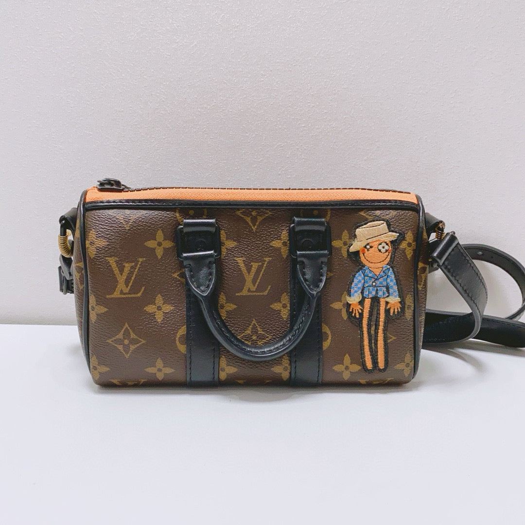 Louis Vuitton - Keepall XS Scarecrow - Monogram coated canvas with leather trim - Brown - (mini)