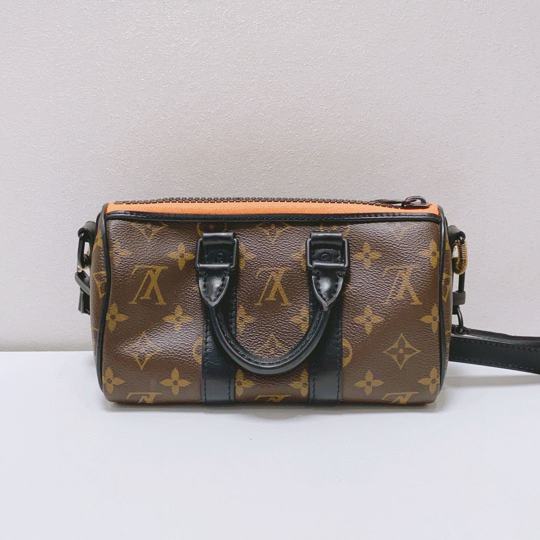 Louis Vuitton - Keepall XS Scarecrow - Monogram coated canvas with leather trim - Brown - (mini)