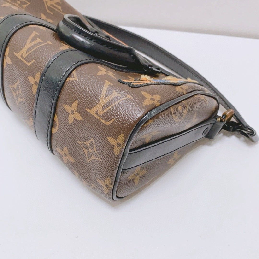 Louis Vuitton - Keepall XS Scarecrow - Monogram coated canvas with leather trim - Brown - (Mini)