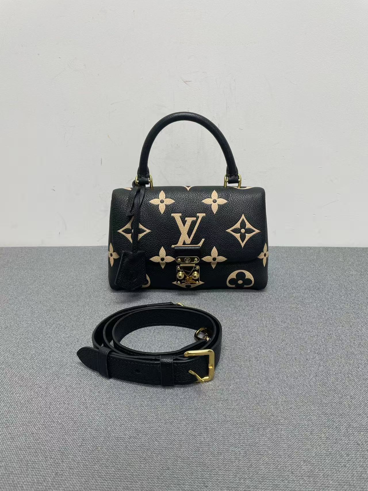 Louis Vuitton - Madeleine Small - Grained leather - Black with Beige motifs and Red interior - (Small)