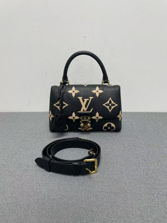 Louis Vuitton - Madeleine Small - Grained leather - Black with Beige motifs and Red interior - (Small)