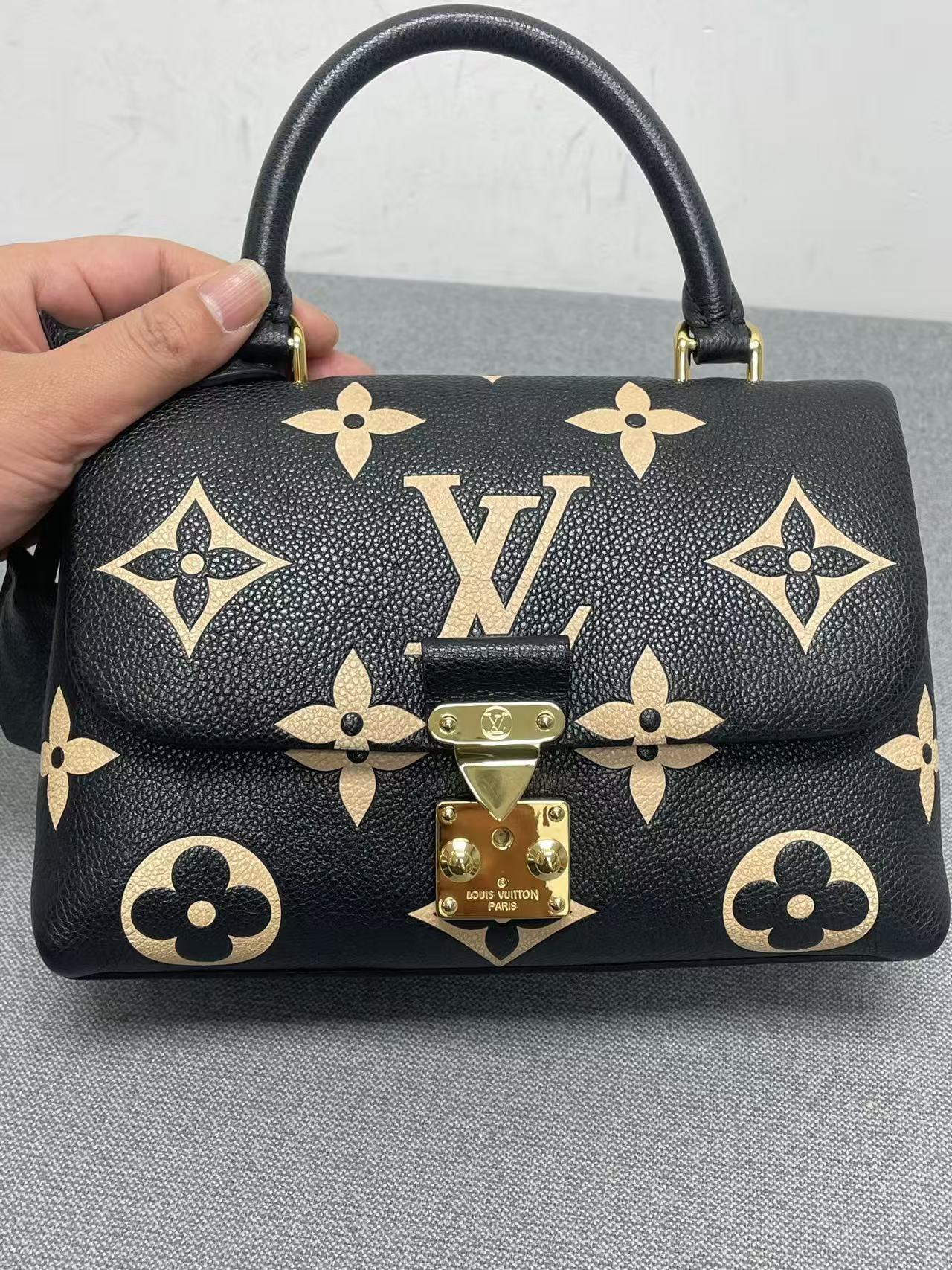 Louis Vuitton - Madeleine Small - Grained leather - Black with Beige motifs and Red interior - (Small)