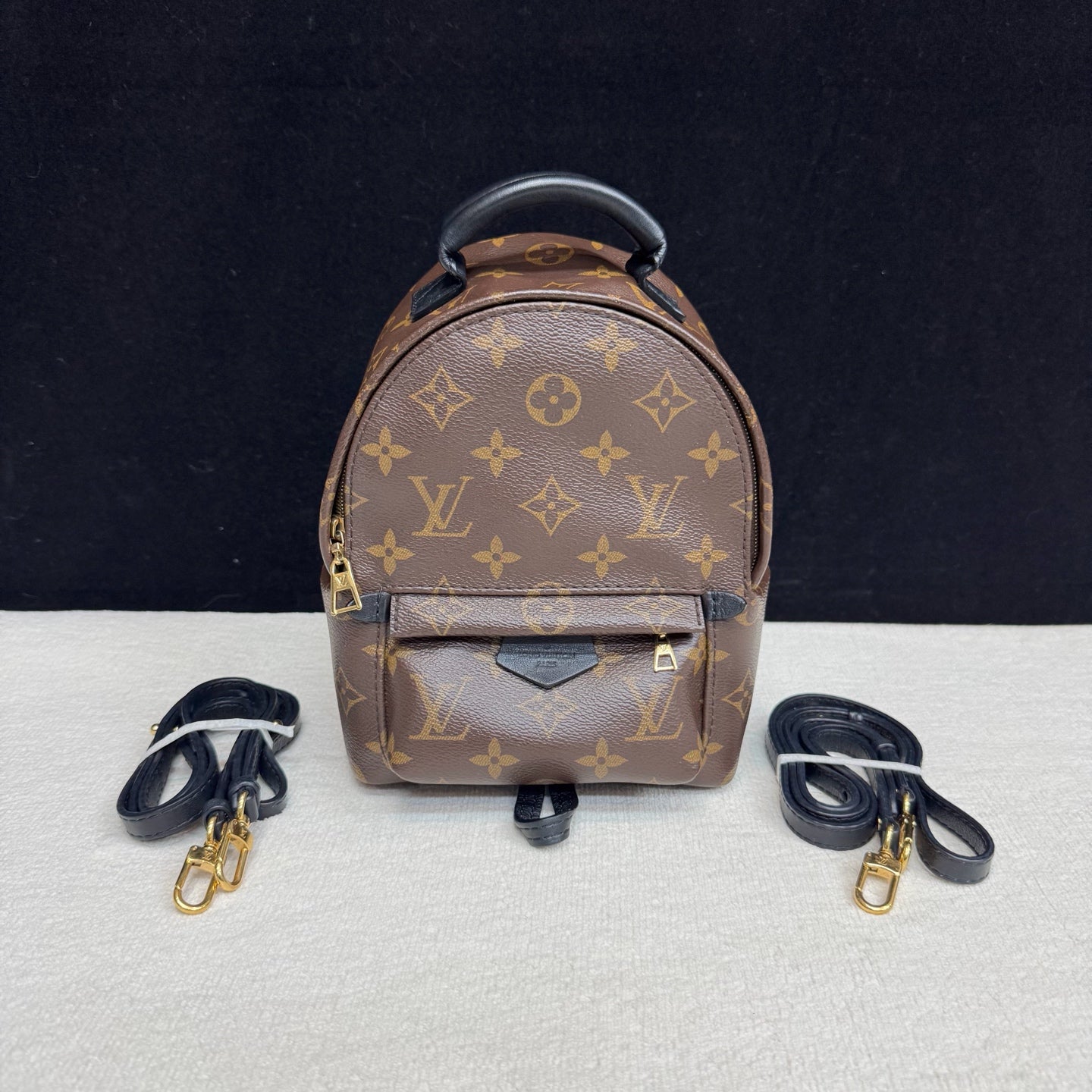 Louis Vuitton - Mini Backpack - Monogram coated canvas with leather trim - Brown with black accents - (mini)