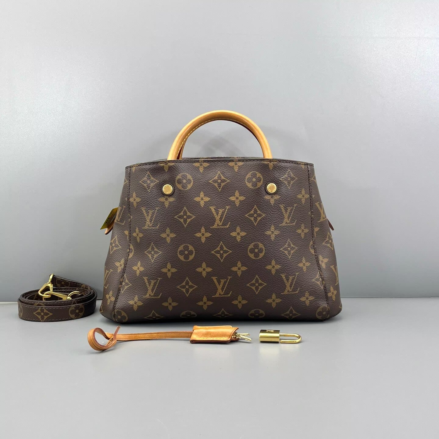 Louis Vuitton - Montaigne BB - Monogram coated canvas and Vachetta leather - Brown with Natural Tan and Gold-Tone Hardware - (Mini)