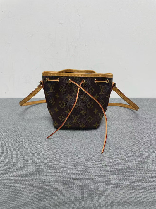 Louis Vuitton - Nano Noé - Monogram coated canvas and Vachetta leather - Brown - (mini)