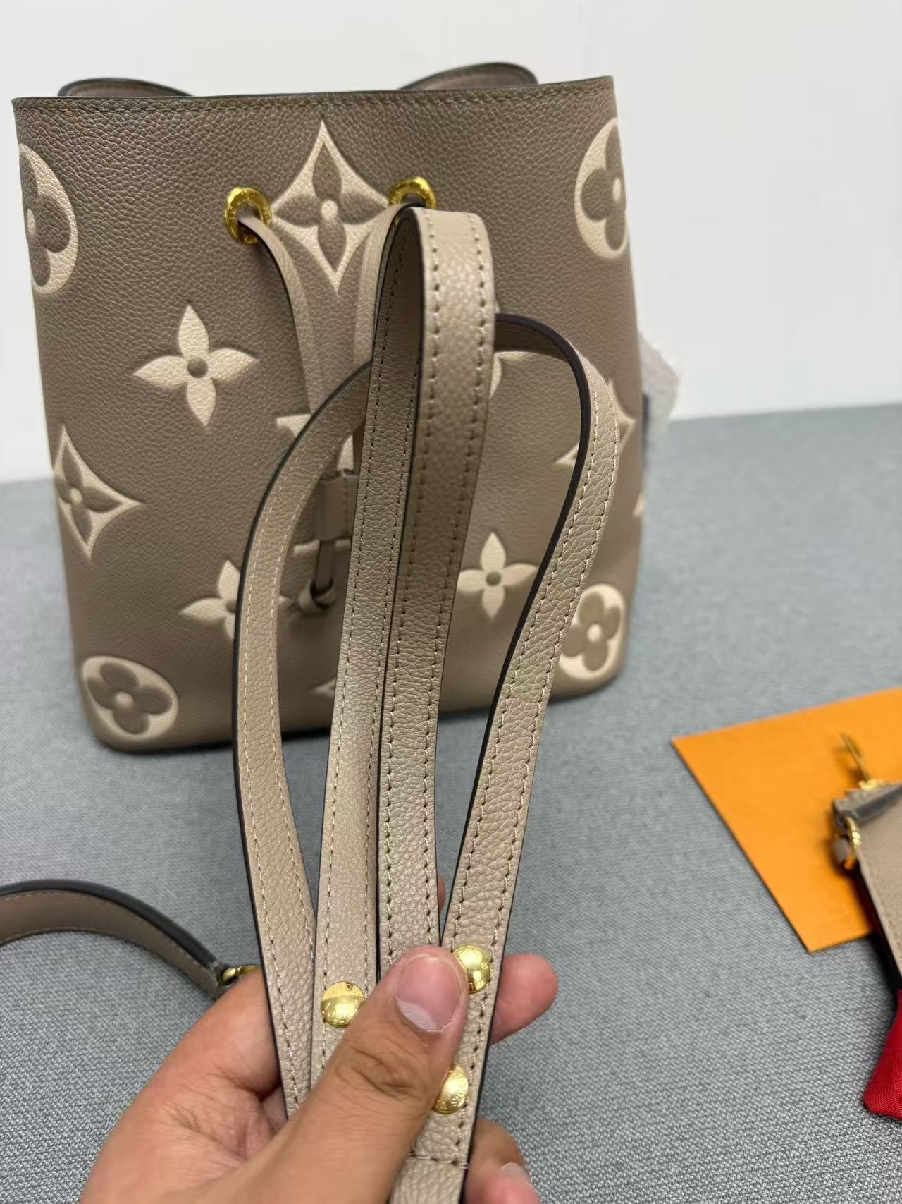 Louis Vuitton - NéoNoé MM - Monogram Empreinte Leather - Taupe / Elephant Grey with Cream Monogram - (Medium)