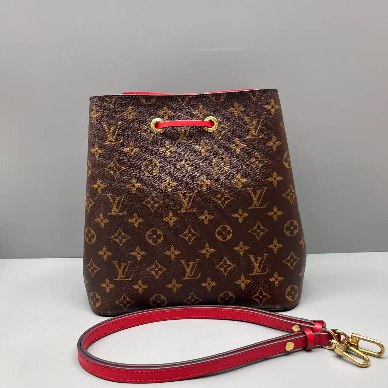 Louis Vuitton - Neonoe - Monogram coated canvas with leather trim - Brown with Red accents - (medium)