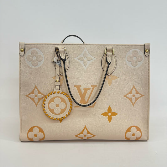 Louis Vuitton - OnTheGo MM - Grained leather - Cream with Orange and White Monogram - (medium)