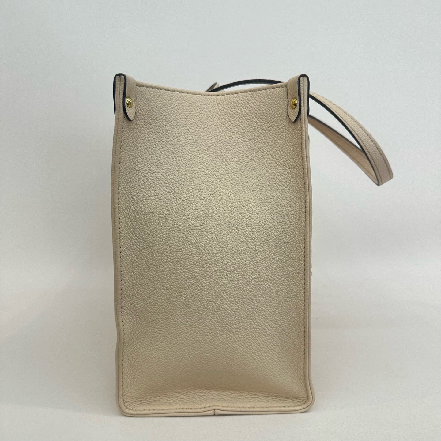 Louis Vuitton - OnTheGo MM - Grained leather - Cream with Orange and White Monogram - (medium)