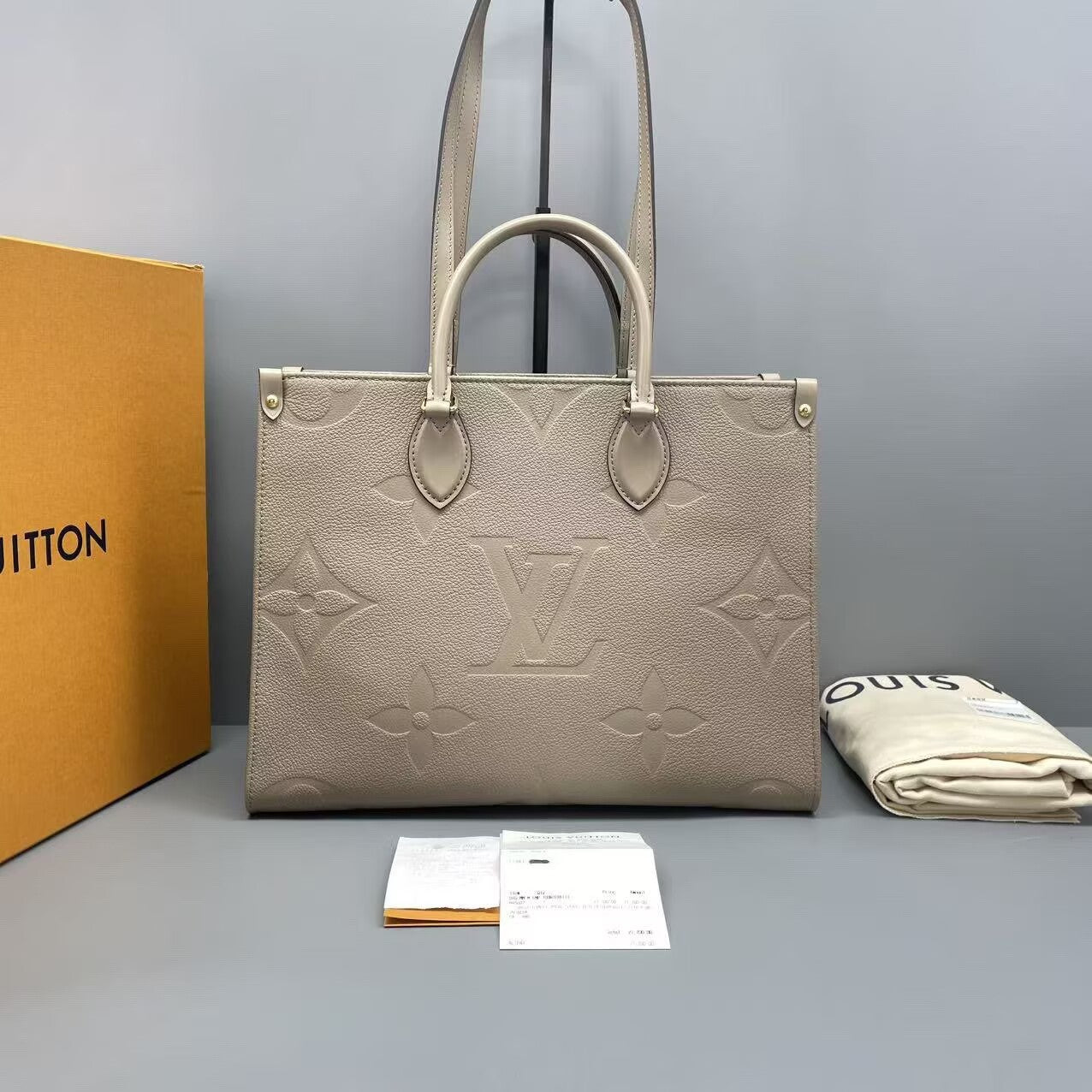 Louis Vuitton - Onthego - Monogram Empreinte leather - Elephant Grey - (Medium)