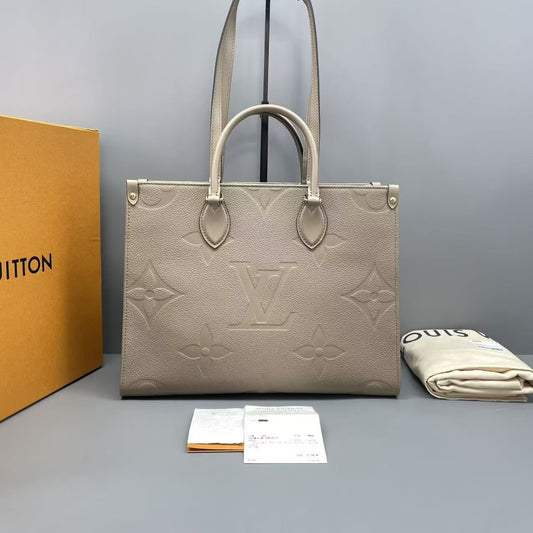 Louis Vuitton - Onthego - Monogram Empreinte leather - Elephant Grey - (Medium)