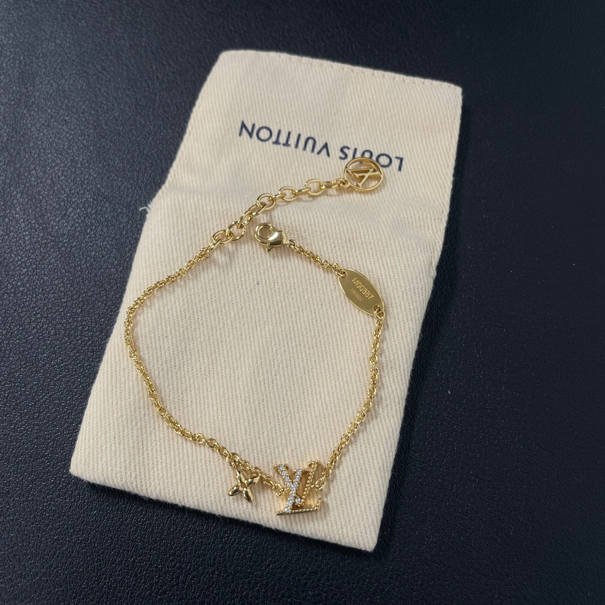 Louis Vuitton - Other - Gold-tone metal with clear stones. - Gold - (18 cm)