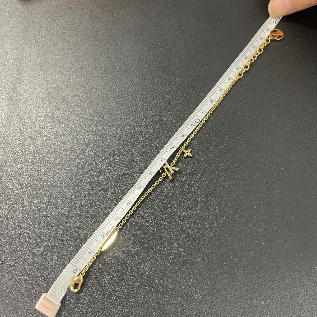 Louis Vuitton - Other - Gold-tone metal with clear stones. - Gold - (18 cm)