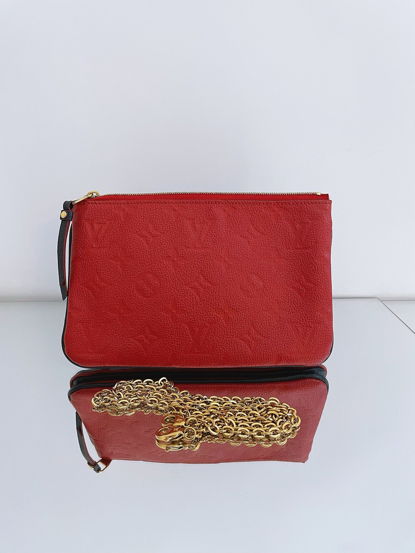 Louis Vuitton - Pochette Double Zip - Embossed cowhide leather - Blue and Red Bi-color with Gold-Tone Hardware - (mini)