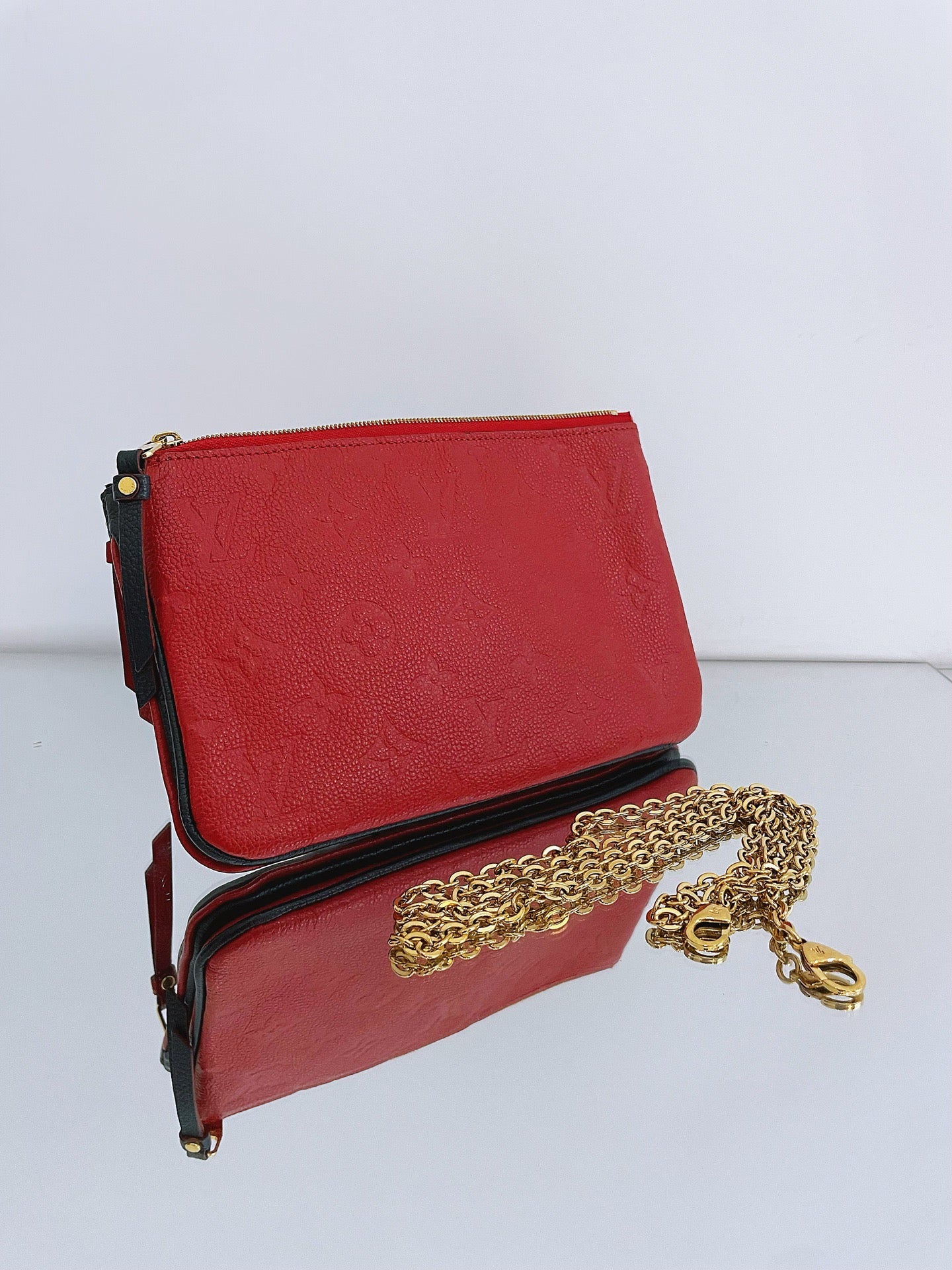 Louis Vuitton - Pochette Double Zip - Embossed cowhide leather - Blue and Red Bi-color with Gold-Tone Hardware - (mini)