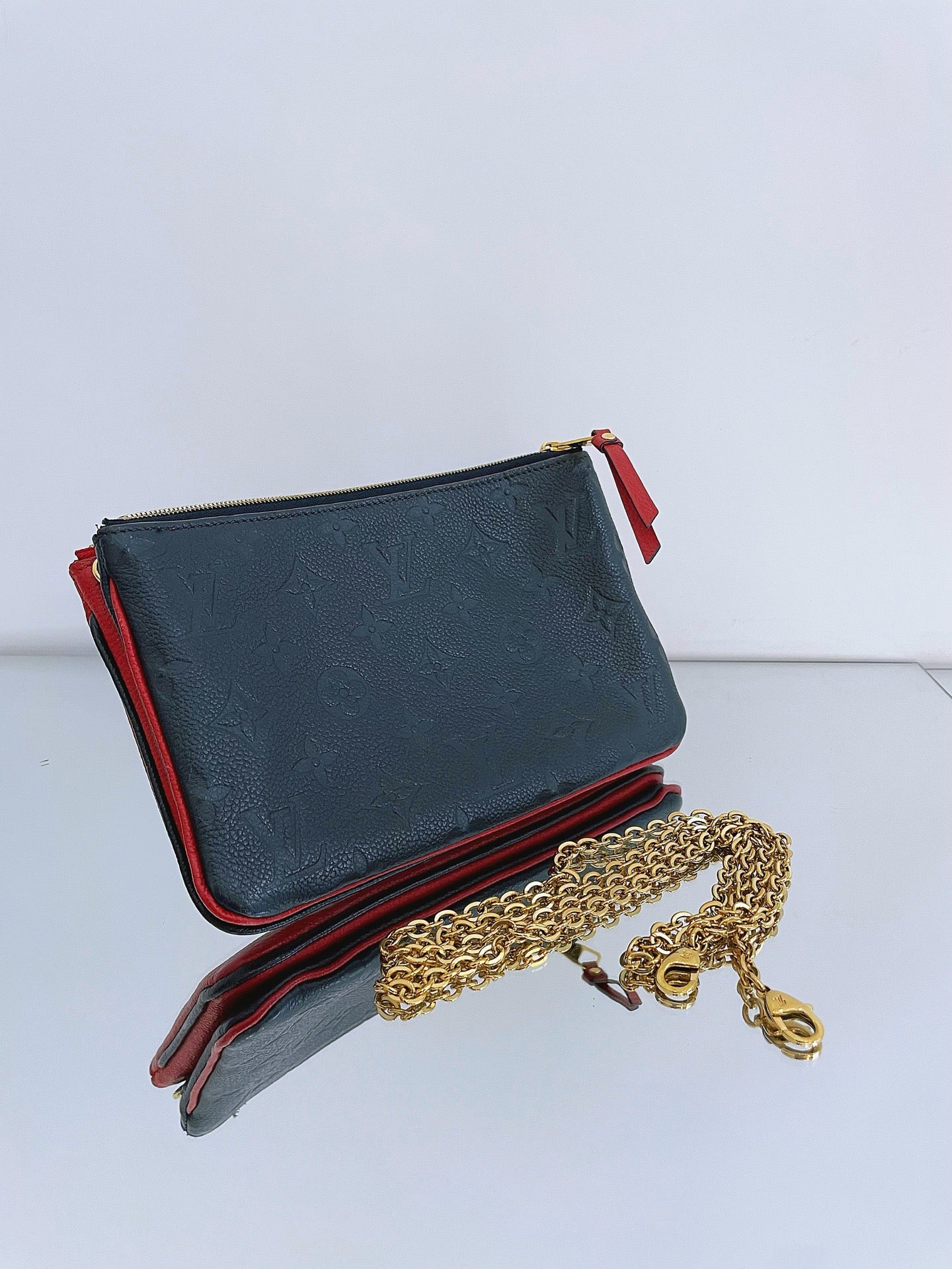 Louis Vuitton - Pochette Double Zip - Embossed cowhide leather - Blue and Red Bi-color with Gold-Tone Hardware - (mini)
