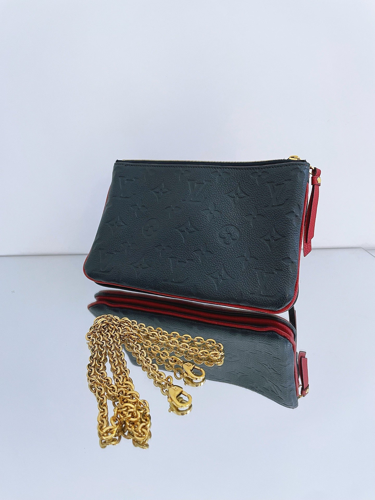 Louis Vuitton - Pochette Double Zip - Embossed cowhide leather - Blue and Red Bi-color with Gold-Tone Hardware - (mini)