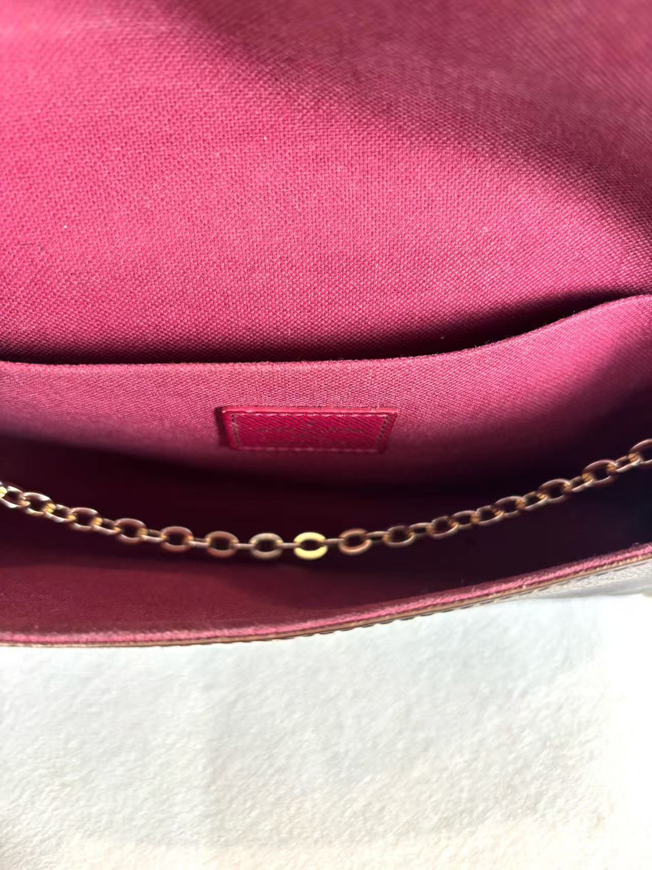Louis Vuitton - Pochette Félicie - Monogram coated canvas with leather trim - Brown with fuchsia interior - (mini)