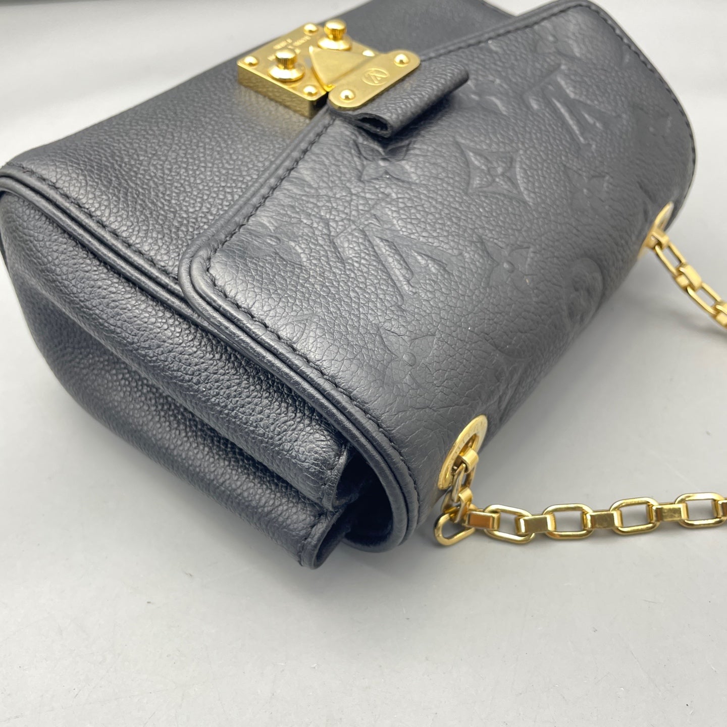 Louis Vuitton - Pochette Metis Mini - Grained Monogram Empreinte leather - Black - (mini)