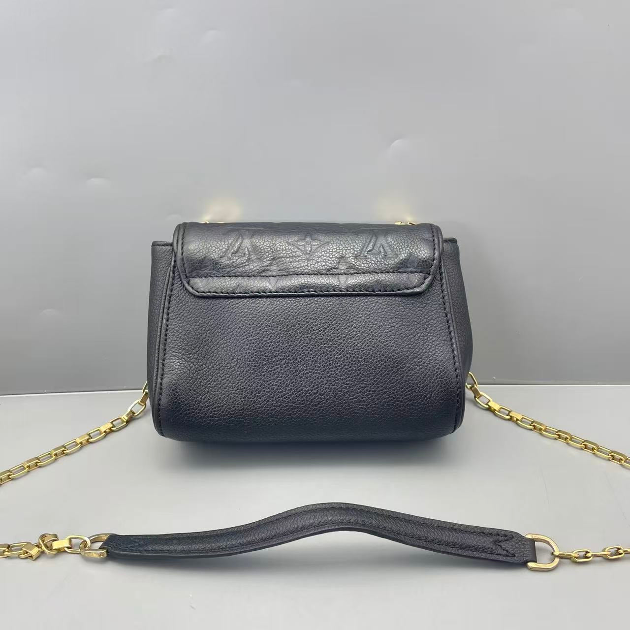 Louis Vuitton - Pochette Metis Mini - Grained Monogram Empreinte leather - Black - (mini)