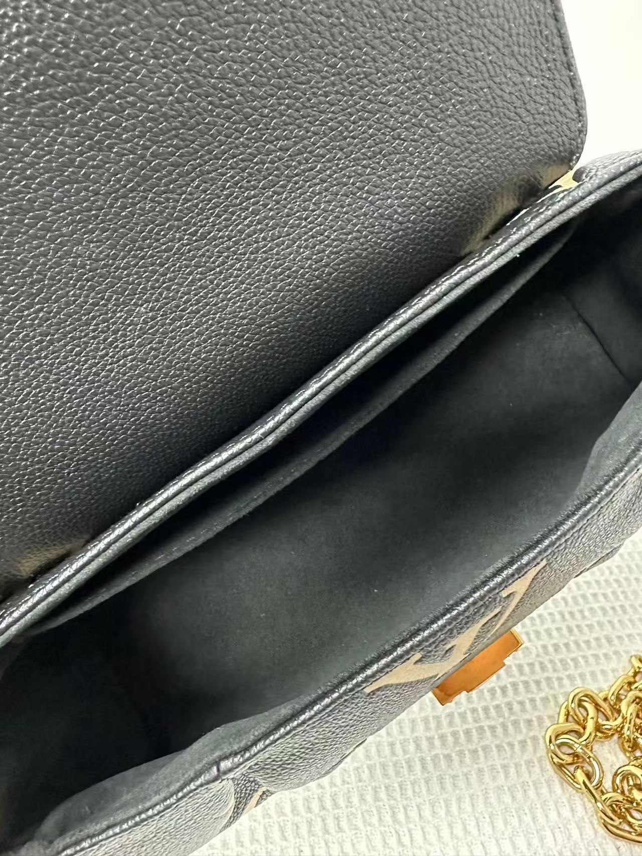 Louis Vuitton - Pochette Metis - Monogram Empreinte Leather - Black - (medium)