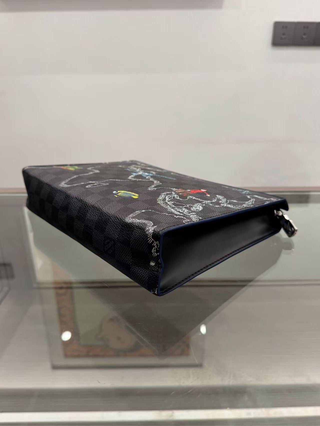 Louis Vuitton - Pochette Voyage - Coated canvas with leather trim - Multicolour with Black and Grey - (Medium)