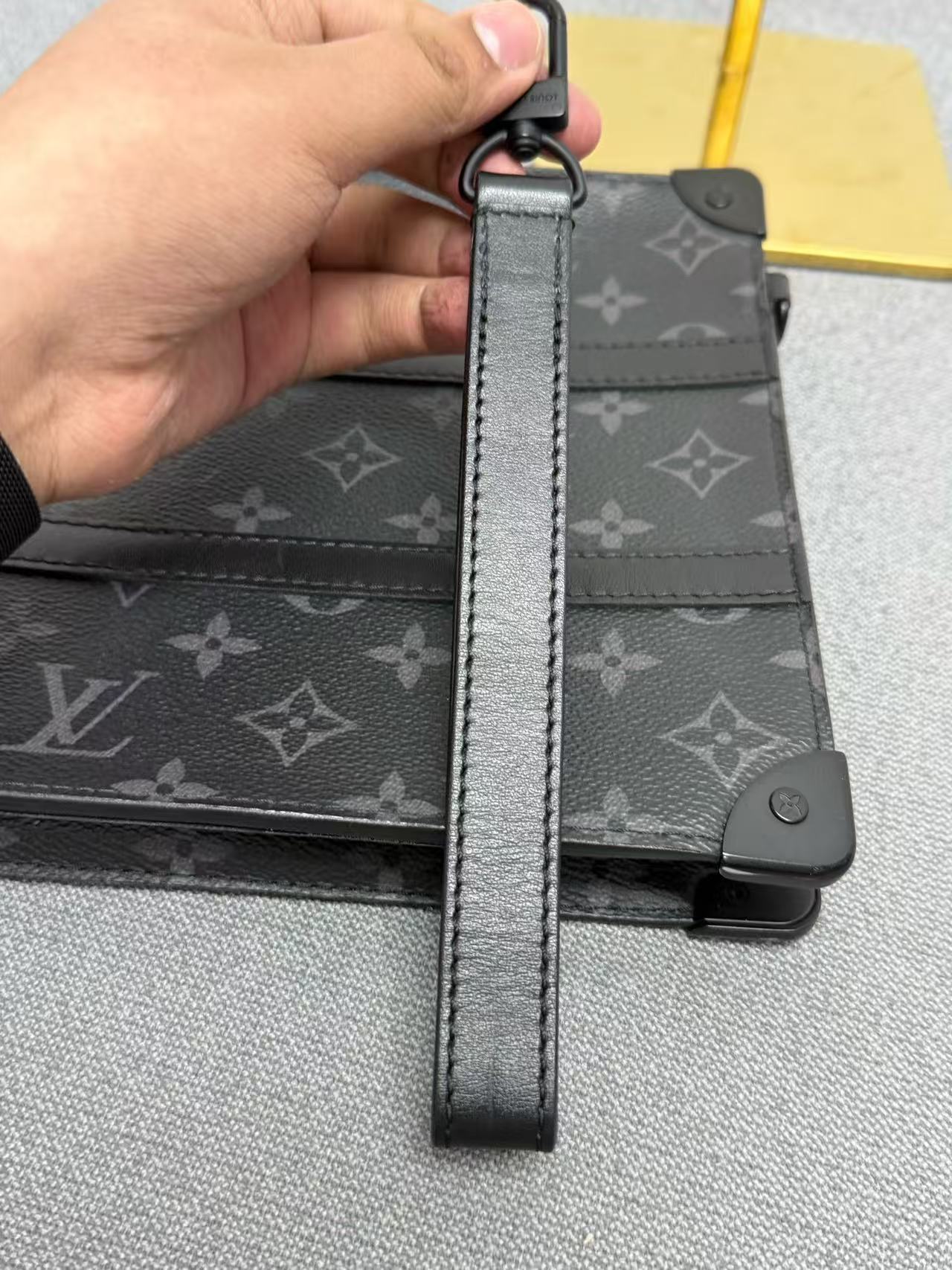 Louis Vuitton - Pochette Voyage - Monogram Eclipse coated canvas with leather trim - Grey - (medium)