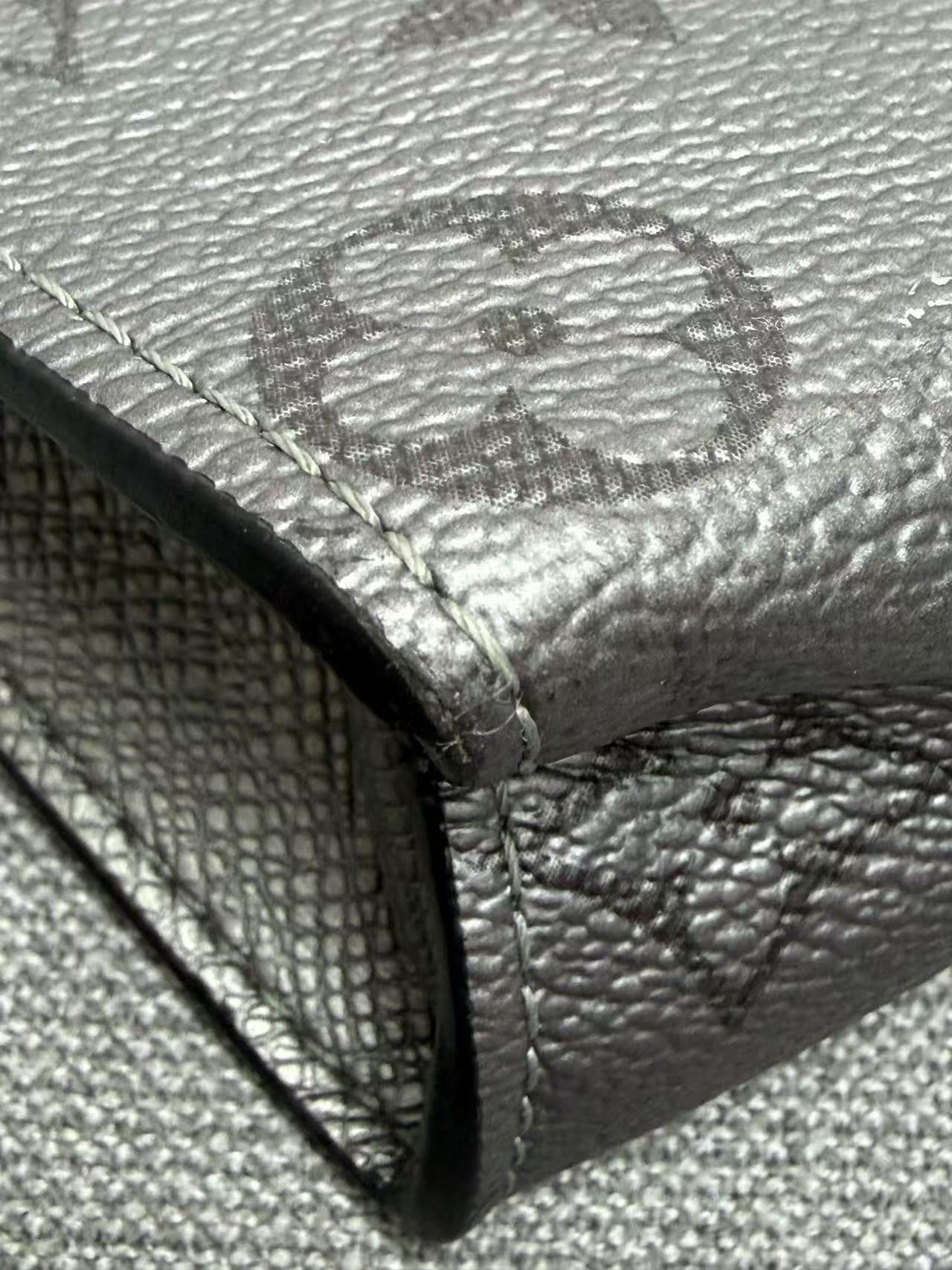 Louis Vuitton - Pochette Voyage - Monogram Eclipse Reverse coated canvas with leather trim - Grey with darker grey monogram - (Medium)