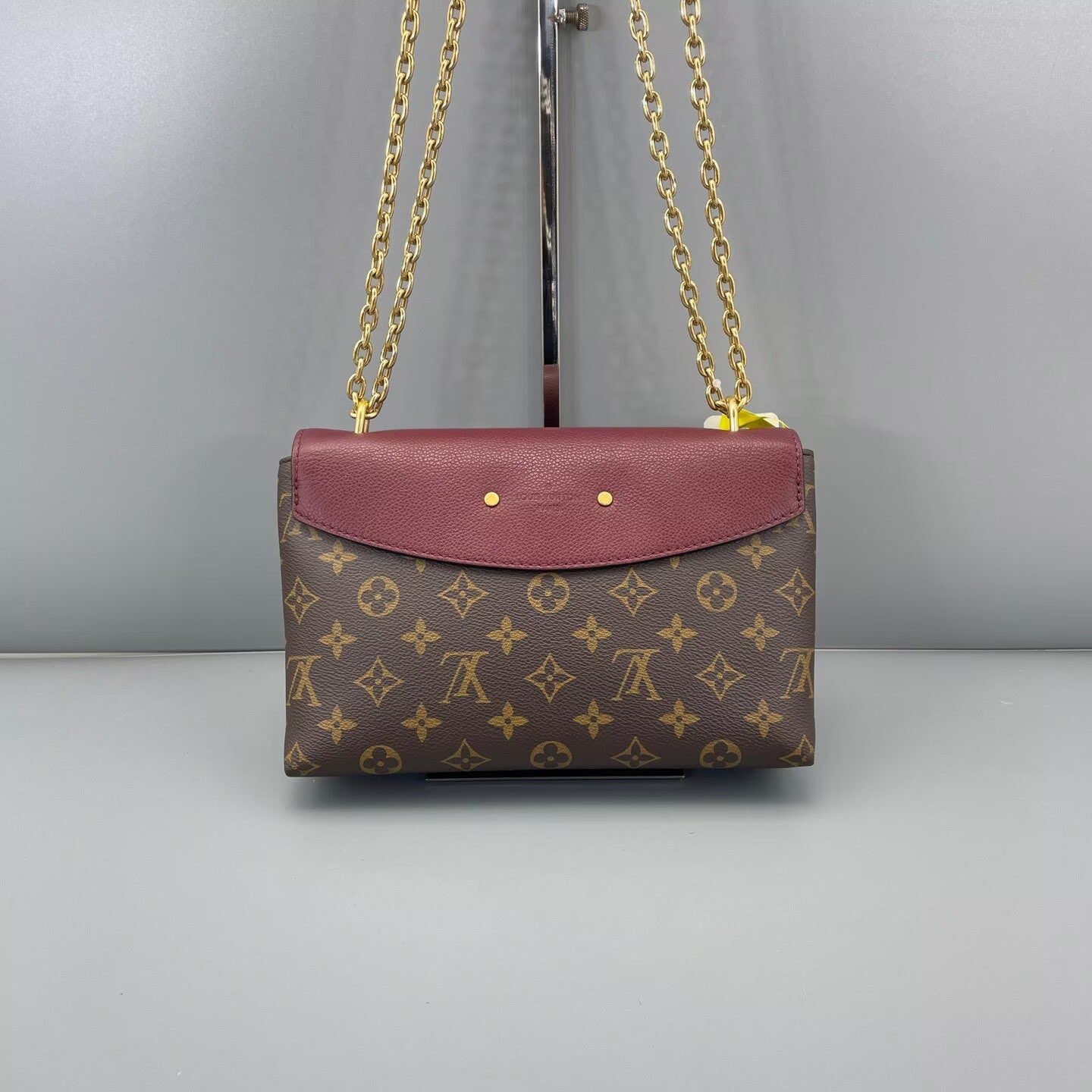 Louis Vuitton - Saint Placide - Monogram coated canvas with grained leather trim - Brown and Burgundy - (medium)