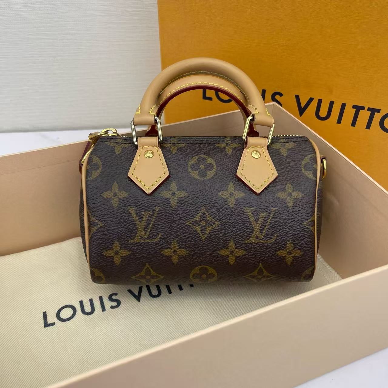 Louis Vuitton - Speedy Nano - Monogram coated canvas with natural cowhide leather trim - Brown - (mini)